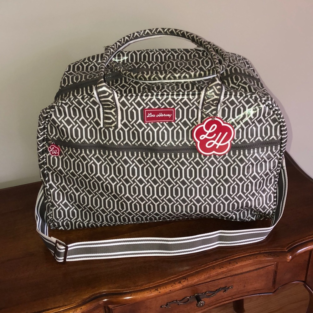 Vinyl coated fabric tote with geo design.